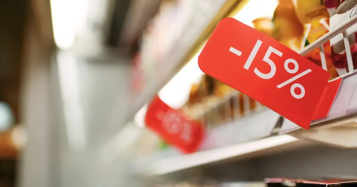 15 percent off sign in a grocery store
