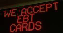 grocery store sign accepting EBT cards