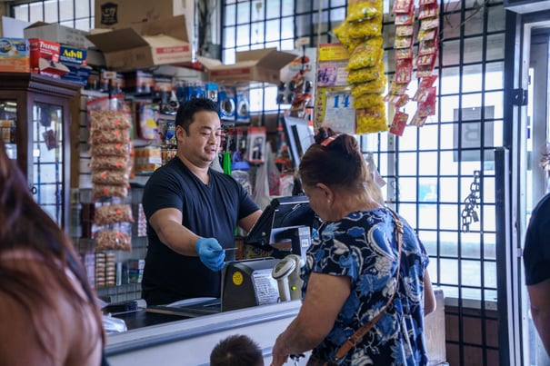 person checking out at store