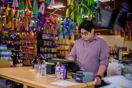 man using grocery pos
