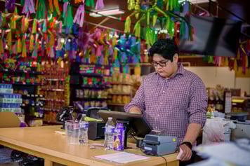 man using grocery pos