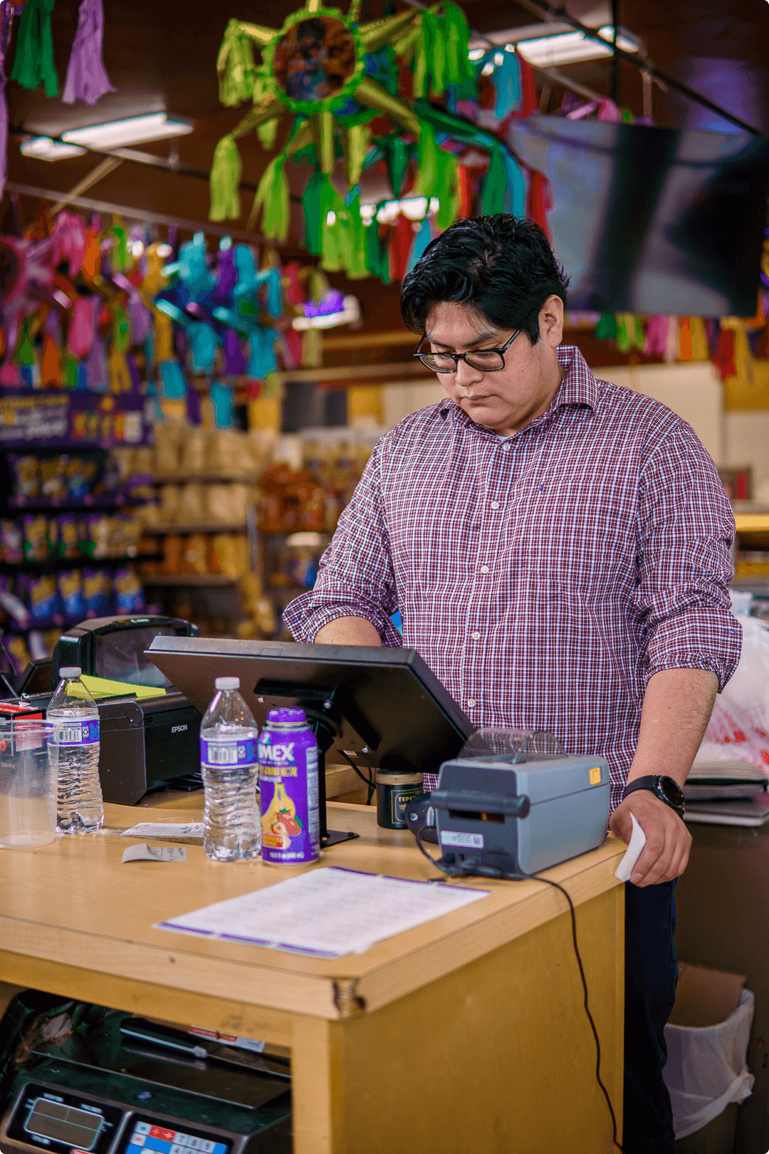 person at grocery store checkout